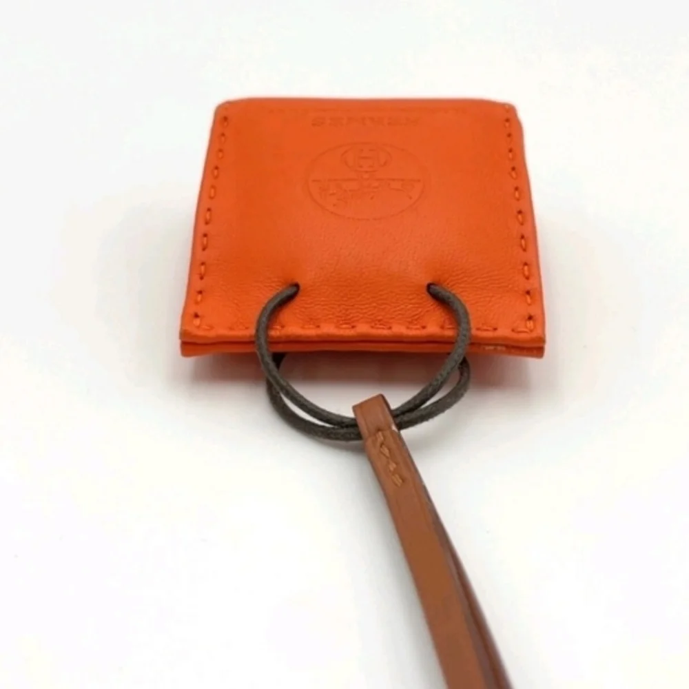 HERMÈS ORANGE LEATHER MINI POUCH BAG CHARM KEY HOLDER + BOX - Picture 7 of 12